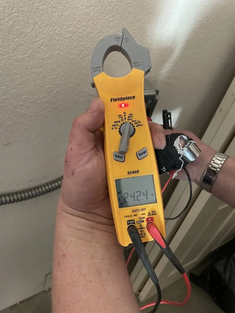Voltage testing with clamp meter during Generator Installation in Del Rio